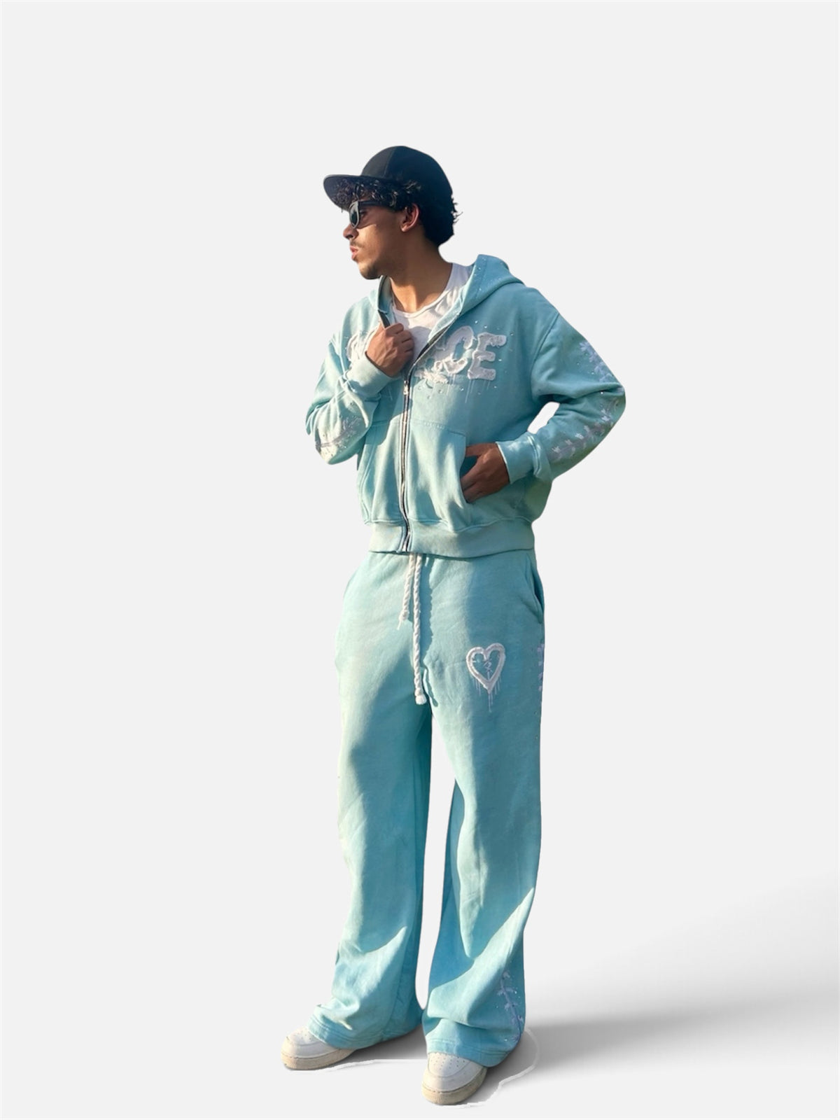 Blue Solace set worn by a model with a cap